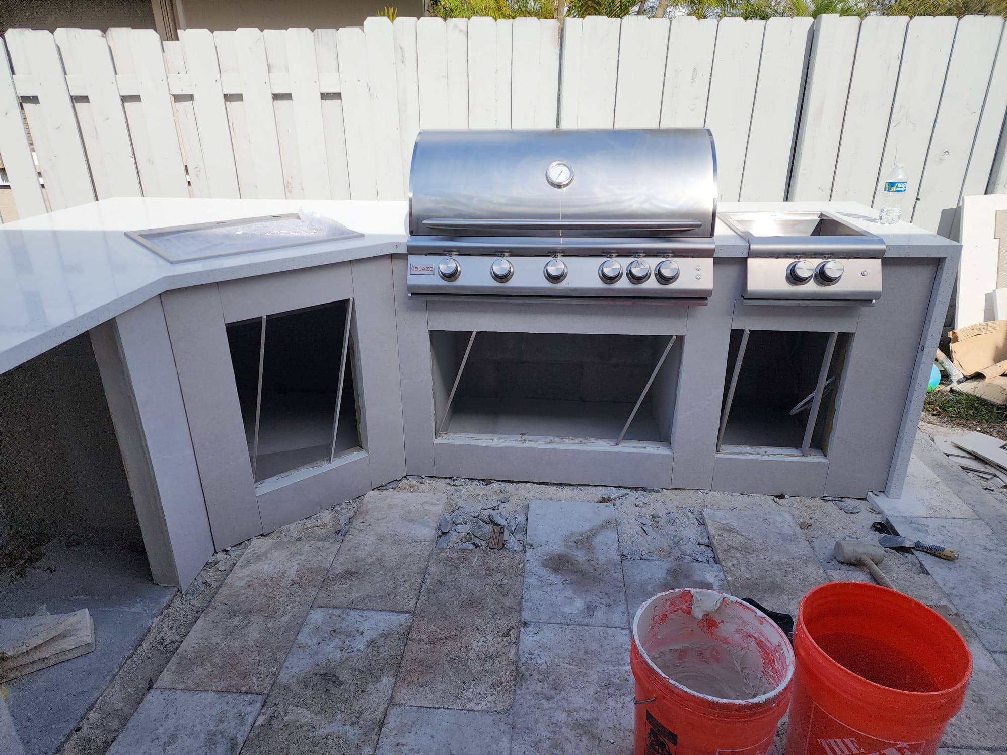 Covered patio, lighting, or evening outdoor living space.